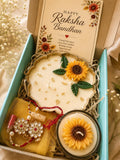Raksha Bandhan Scented Candle Hamper with Bhaiya Bhabhi Rakhi 6.5 Inch Urli Candle, Sunflower Glass Jar, Roli Chawal Included, Sunflower Design, Festive Gift Hamper