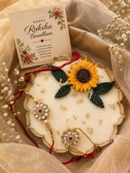 Raksha Bandhan Scented Candle Hamper with Bhaiya Bhabhi Rakhi 6.5 Inch Urli Candle, Sunflower Glass Jar, Roli Chawal Included, Sunflower Design, Festive Gift Hamper